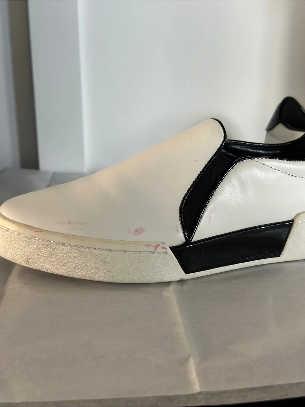 Michael Kors White and Black Slip-On Sneakers